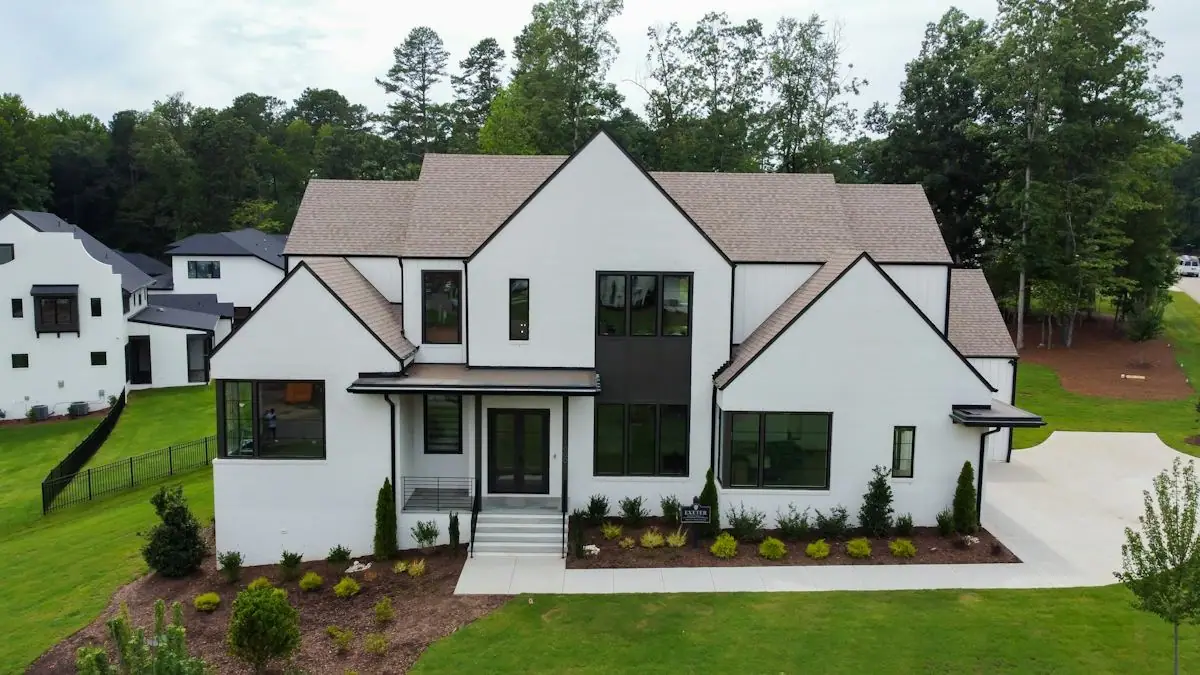 White modern farmhouse with black trim
